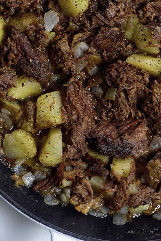 Southern Beef Hash Recipe - Southern Beef Hash is a great way to use leftover roast beef in a whole new way. Full of potatoes, onions, garlic, and roast beef, beef hash is a favorite. // addapinch.com