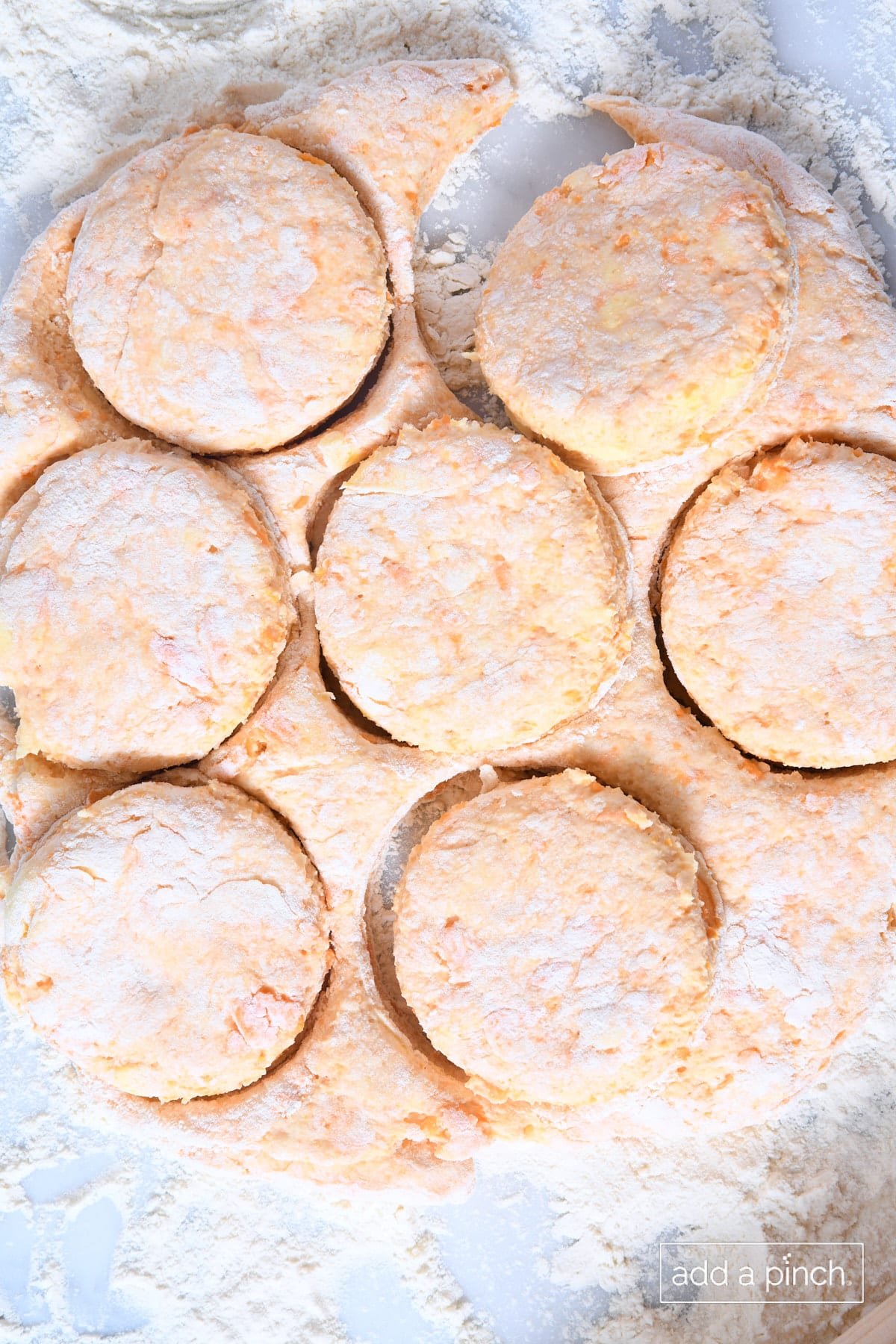 Cut sweet potato biscuit dough.