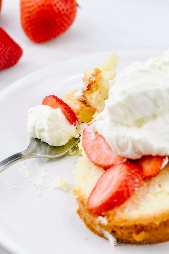 This Cream Cheese Pound Cake recipe is a delicious family favorite pound cake loved for generations. Simple to make with only seven ingredients, this is the best cream cheese pound cake and makes a perfect dessert! // addapinch.com