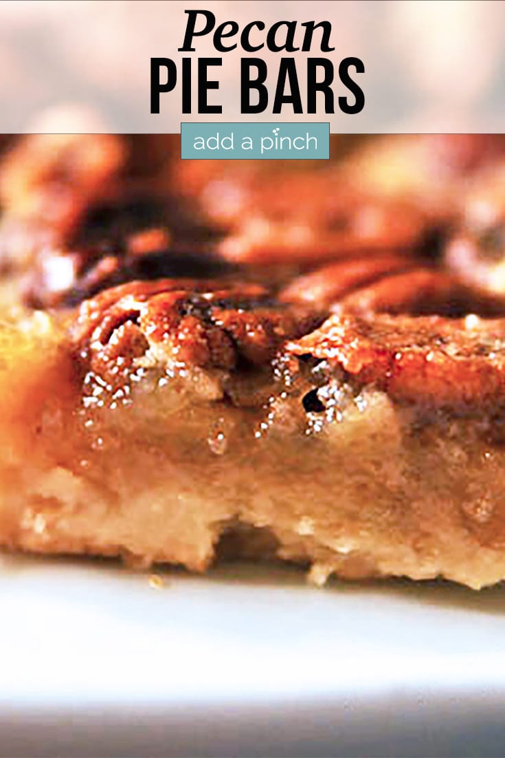 Closeup of Pecan Pie Bars cut into slice - with text - addapinch.com