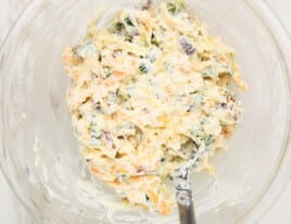 Combined jalapeno popper dip in a mixing bowl