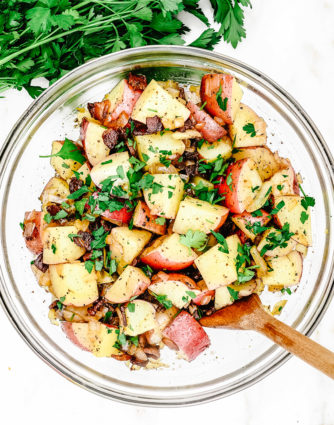 Warm Potato Salad with Bacon and Onion Recipe - A simple, savory potato salad perfect for summer parties, camping, potlucks and picnics! // addapinch.com