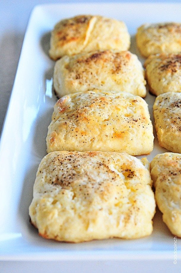 Peppered Buttermilk Biscuits make a delicious additional to any biscuit recipe box. Great served with savory dishes, as a sandwich biscuit, and to add a pop of flavor. // addapinch.com