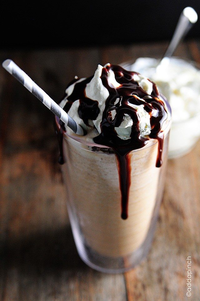 Photograph of Frappuccino topped with whipped cream and chocolate syrup