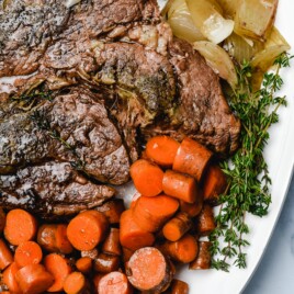 Classic Pot Roast is an easy comfort food that is an absolute favorite. A one pot meal made easy in the oven, slow cooker or Instant Pot! // addapinch.com