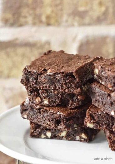 Fudge Brownies Recipe - Fudge brownies are a favorite chocolate dessert and this recipe makes decadent, scrumptious fudge brownies from scratch. // addapinch.com