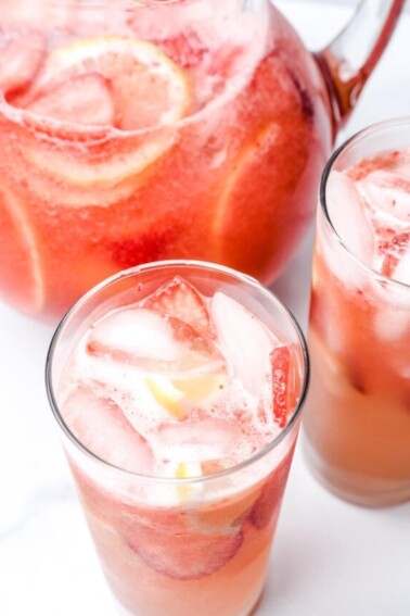 A delicious Strawberry Lemonade that's so easy and refreshing! Made from strawberries, lemons and simple syrup, it's perfect to enjoy all spring and summer! // addapinch.com