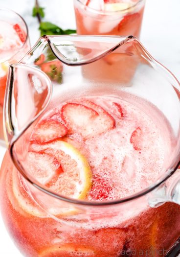 A delicious Strawberry Lemonade that's so easy and refreshing! Made from strawberries, lemons and simple syrup, it's perfect to enjoy all spring and summer! // addapinch.com