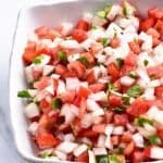 Pico de Gallo Recipe - Pico de Gallo has to be one of the simplest recipes to make and adds so, so, so much flavor to any number of dishes as a topping or just right by itself on a chip! // addapinch.com