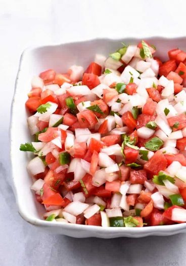 Pico de Gallo Recipe - Pico de Gallo has to be one of the simplest recipes to make and adds so, so, so much flavor to any number of dishes as a topping or just right by itself on a chip! // addapinch.com