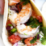 Shrimp Tacos Recipe - These quick and easy shrimp tacos are always a favorite. Made with delicious, tender grilled shrimp, pico de gallo in a soft taco. // addapinch.com