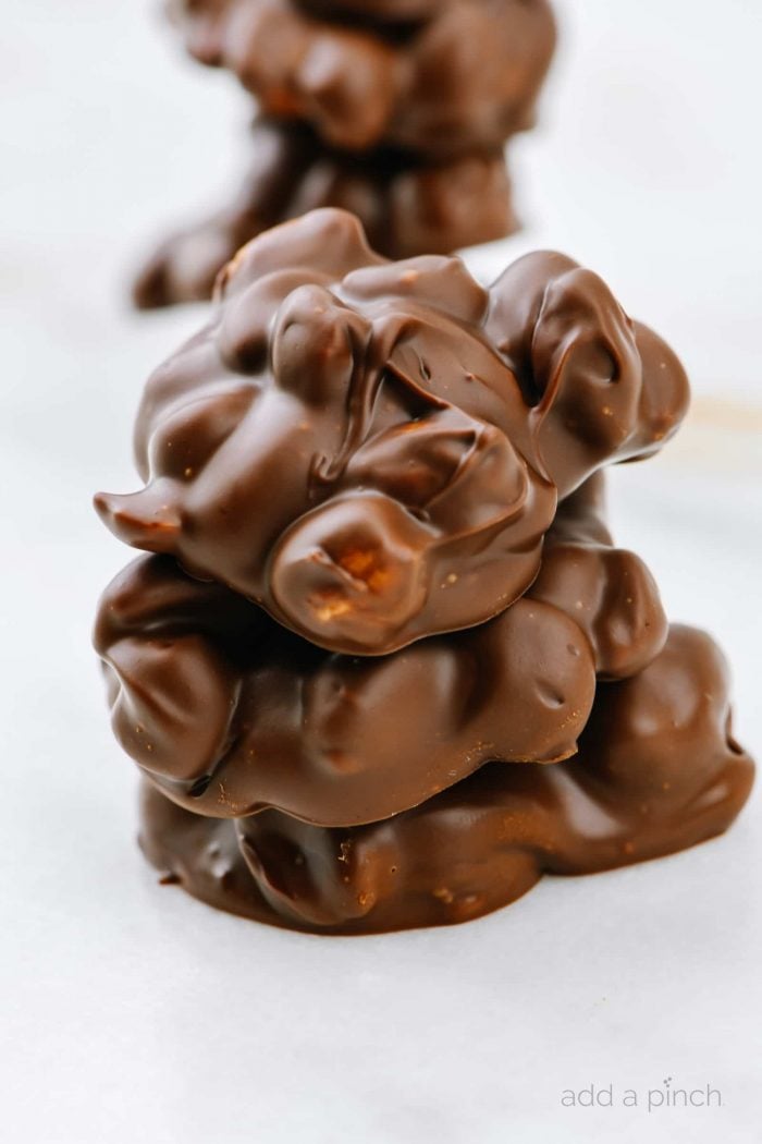 Chocolate Peanut Butter Clusters make one of my favorite no-bake chocolate candy recipes!Â  With only five ingredients, these delicious treats are so simple to make! // addapinch.com