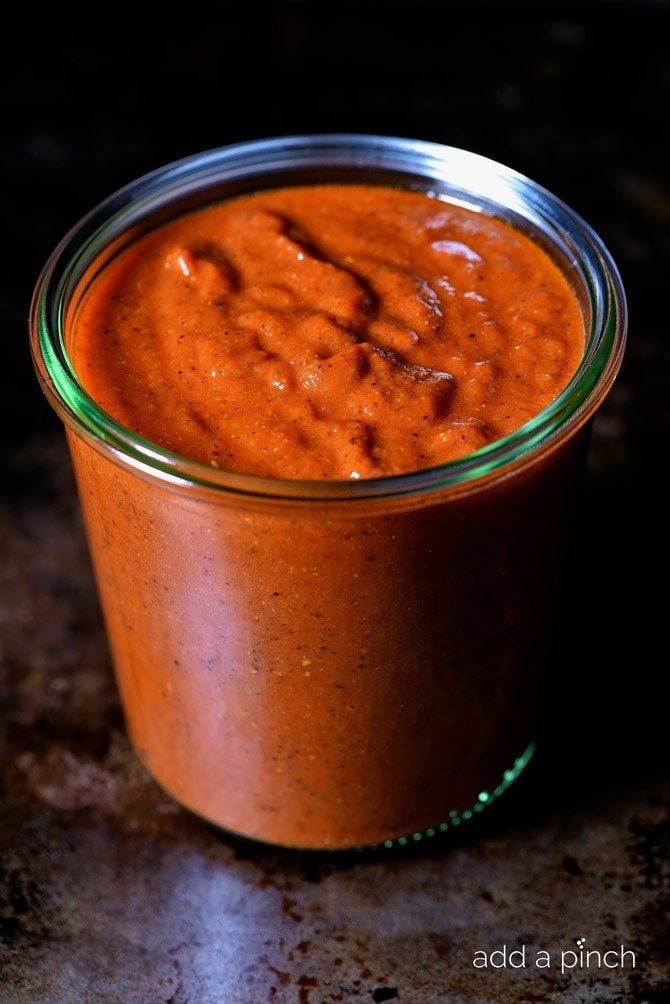 Enchilada Sauce makes a staple ingredient to keep on hand for quick meals. This easy red enchilada sauce comes together quickly and keeps in the refrigerator for up to two weeks! // addapinch.com