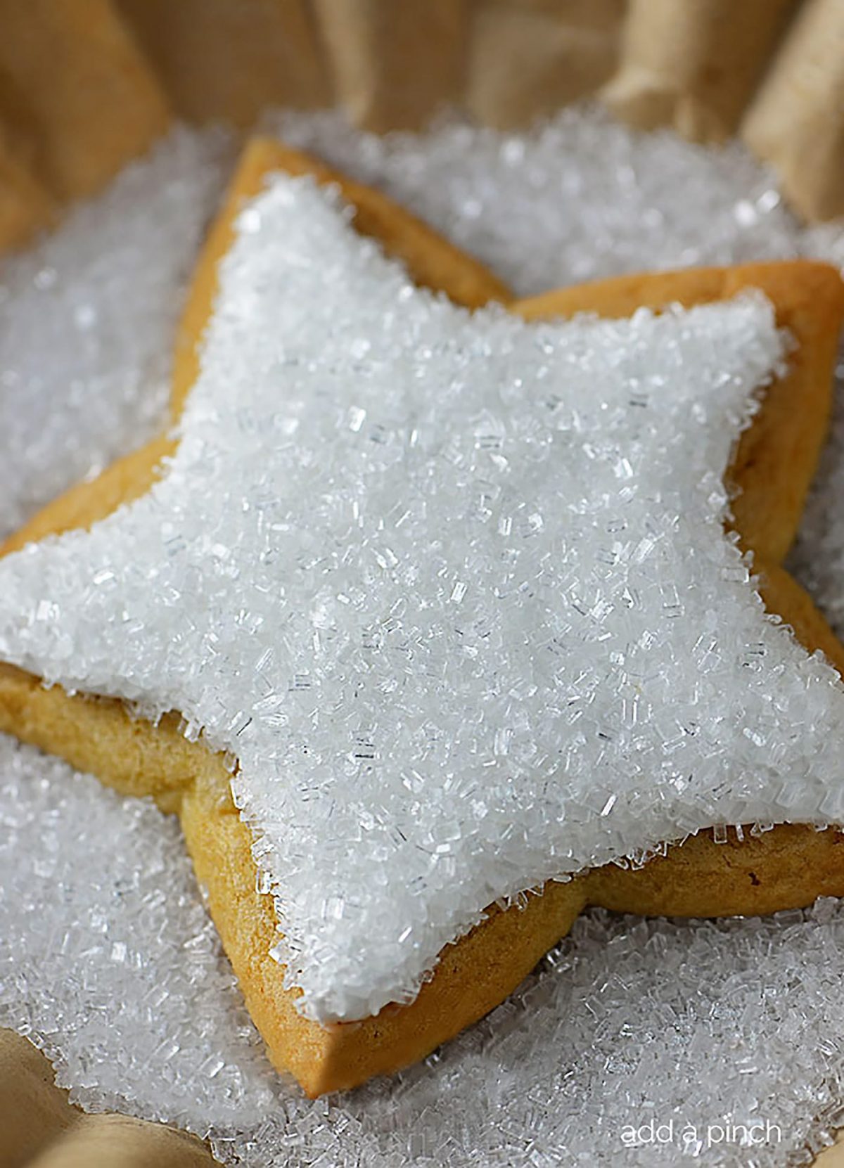 Cut Out Sugar Cookie Recipe - This sugar cookie recipe is an heirloom family recipe used for generations. A simple sugar cookie recipe that makes perfect roll out sugar cookies that are perfect for decorating. // addapinch.com