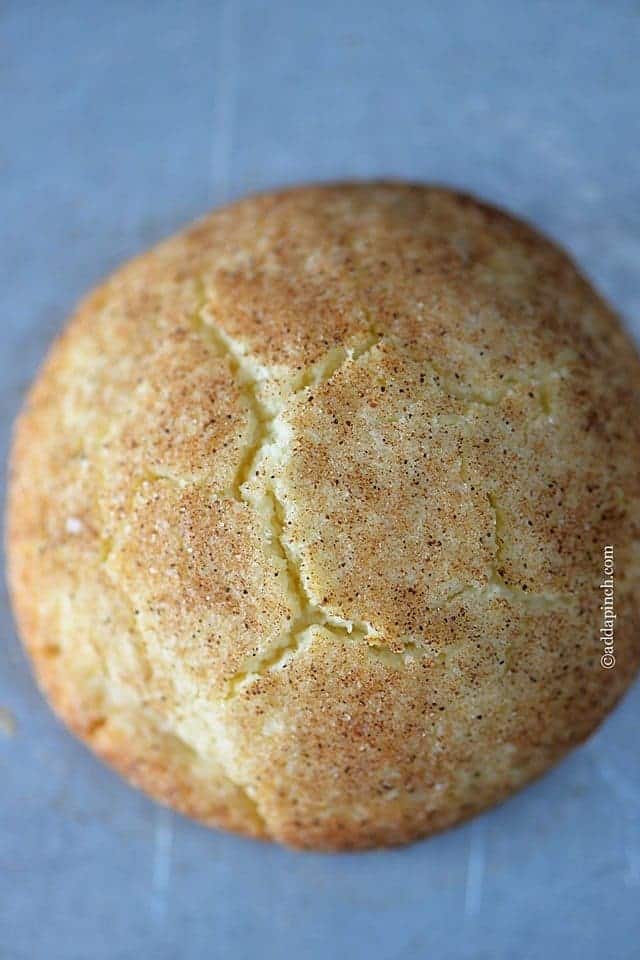 Large Snickerdoodles Cookie topped with cinnamon sugar  -addapinch.com