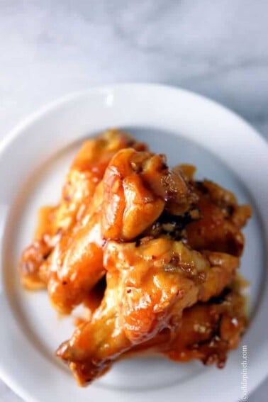 Maple Glazed Chicken Wings Recipe | ©addapinch.com