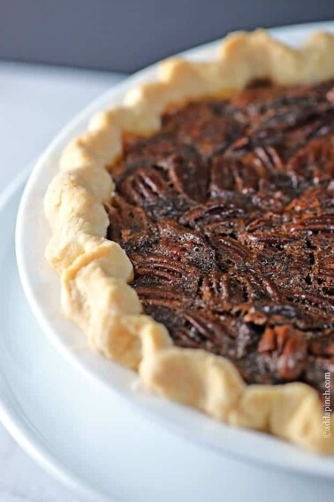 The BEST Pecan Pie Recipe - The BEST Pecan Pie Recipe - This Pecan Pie Recipe is a classic in my husband's family. For every family gathering, you better believe there will be pecan pie sitting front and center on the dessert table. Every. single. time. // addapinch.com