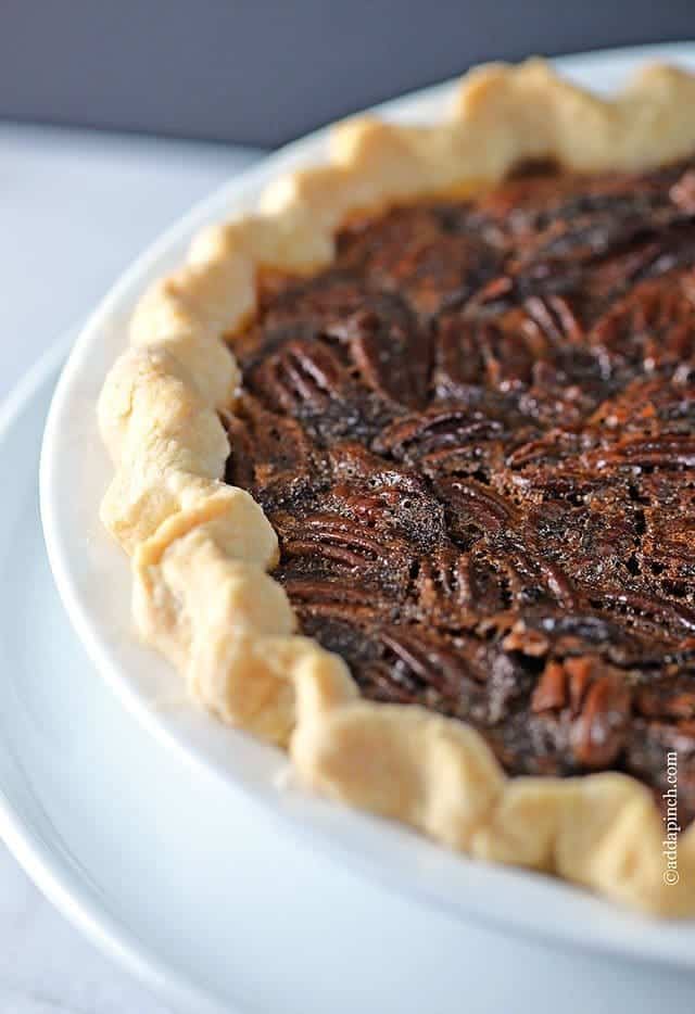 The BEST Pecan Pie Recipe - The BEST Pecan Pie Recipe - This Pecan Pie Recipe is a classic in my husband's family. For every family gathering, you better believe there will be pecan pie sitting front and center on the dessert table. Every. single. time. // addapinch.com