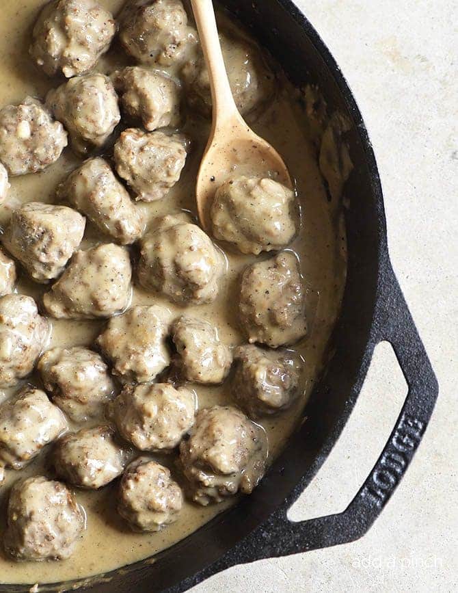 Swedish Meatballs Recipe - Swedish meatballs make a delicious dish served as an appetizer or as a main meal. This family recipe is made from scratch and is a favorite! // addapinch.com