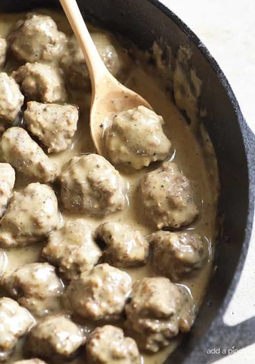 Swedish Meatballs Recipe - Swedish meatballs make a delicious dish served as an appetizer or as a main meal. This family recipe is made from scratch and is a favorite! // addapinch.com