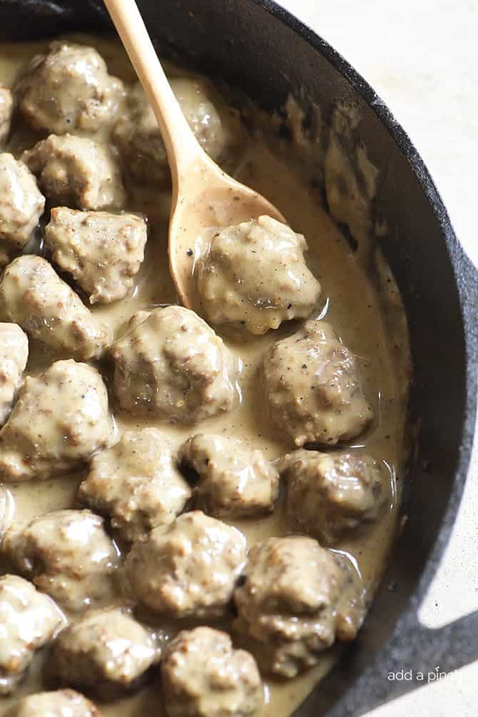 Swedish Meatballs Recipe - Swedish meatballs make a delicious dish served as an appetizer or as a main meal. This family recipe is made from scratch and is a favorite! // addapinch.com