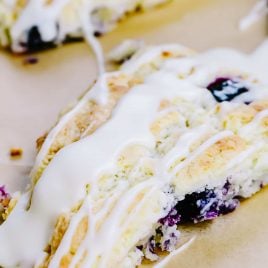 Lemon Blueberry Scones Recipe - Scones make a delicious treat for breakfast, brunch or an afternoon treat. These lemon blueberry scones are full of flavor while being light and moist. // addapinch.com