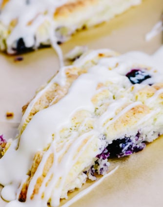 Lemon Blueberry Scones Recipe - Scones make a delicious treat for breakfast, brunch or an afternoon treat. These lemon blueberry scones are full of flavor while being light and moist. // addapinch.com
