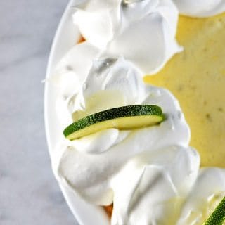 Key Lime Pie Recipe - Key Lime Pie makes a classic, refreshing dessert recipe. Made of simple ingredients, this updated key lime pie recipe comes together quickly and chills to a light and airy consistency for an elegant dessert. // addapinch.com