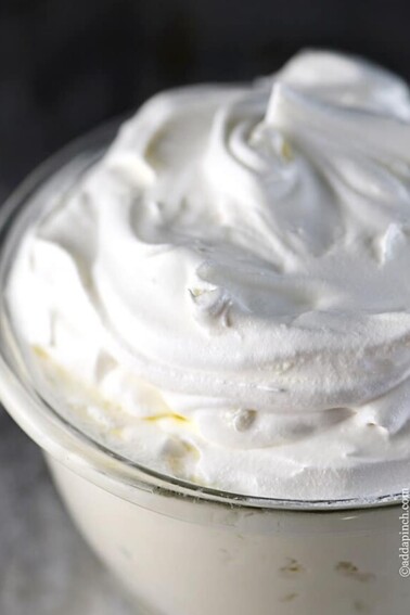 Make the Perfect Whipped Cream recipe every time with these steps and tips! With just three ingredients, it's so easy to make it fresh any time for the best desserts! // addapinch.com