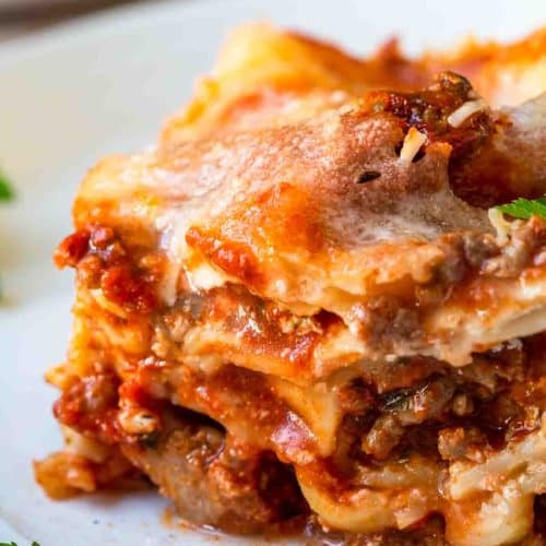 Image of lasagna on a white plate.