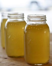 Homemade Chicken Stock Recipe - Learn how to make homemade chicken stock in just a few easy steps! // addapinch.com