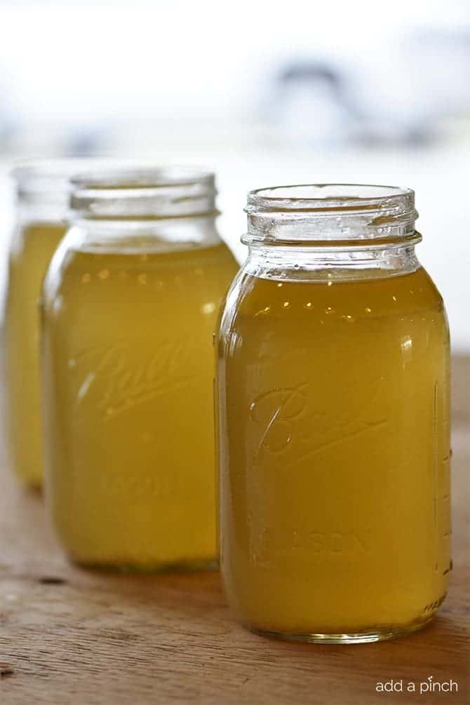 Homemade Chicken Stock Recipe - Learn how to make homemade chicken stock in just a few easy steps! // addapinch.com