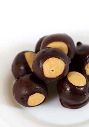 Buckeyes makes a favorite peanut butter and chocolate candy. Named for the nut of the same name, buckeyes are loved through the holidays and all year. // addapinch.com