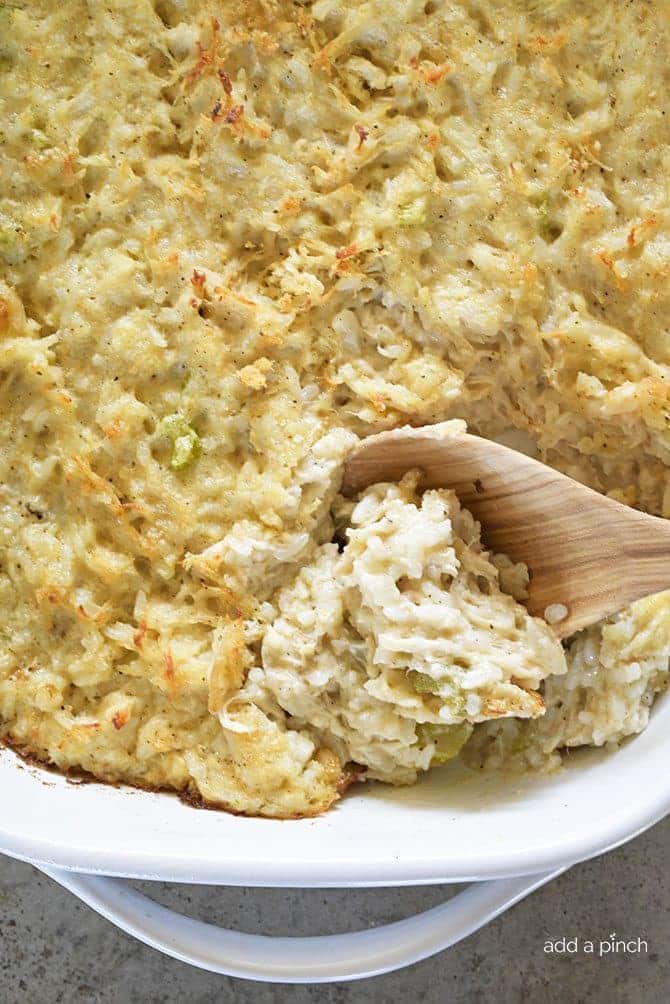 Chicken and Rice Casserole Recipe - Chicken and Rice Casserole makes a classic comforting dish. Made of chicken and rice cooked in a creamy, flavorful casserole, this is a family favorite! // addapinch.com