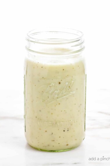 Condensed Cream of Chicken Soup - clear glass jar filled with homemade condensed cream of chicken soup. // addapinch.com