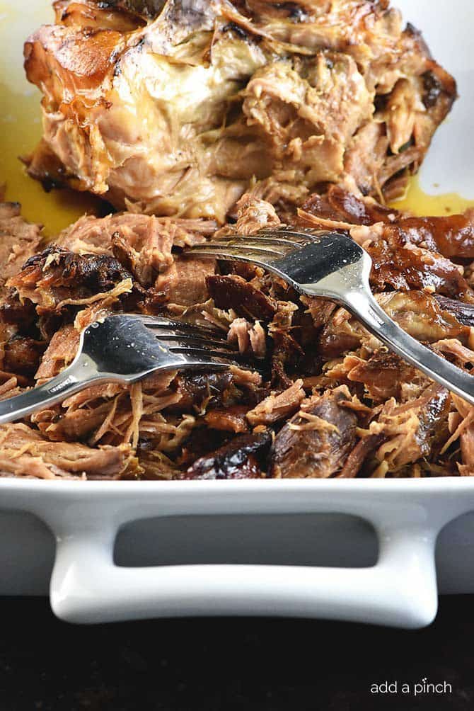 This Slow Cooker Balsamic Pork Roast makes for a family favorite meal that everyone will love. So simple and so full of flavor! // addapinch.com