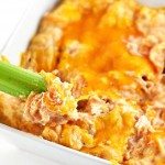 Buffalo Chicken Dip tastes just like the buffalo chicken we all love. This creamy buffalo chicken dip comes together easily and is always a winner! // addapinch.com