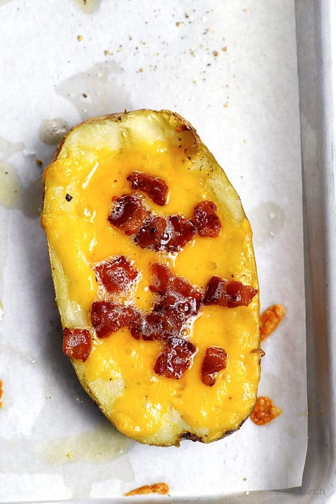 Homemade Potato Skins Recipe - Potato skins make an easy and delicious recipe perfect for parties or game day! // addapinch.com