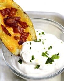 Homemade Potato Skins Recipe - Potato skins make an easy and delicious recipe perfect for parties or game day! // addapinch.com