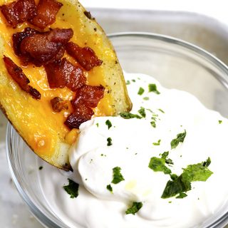 Homemade Potato Skins Recipe - Potato skins make an easy and delicious recipe perfect for parties or game day! // addapinch.com