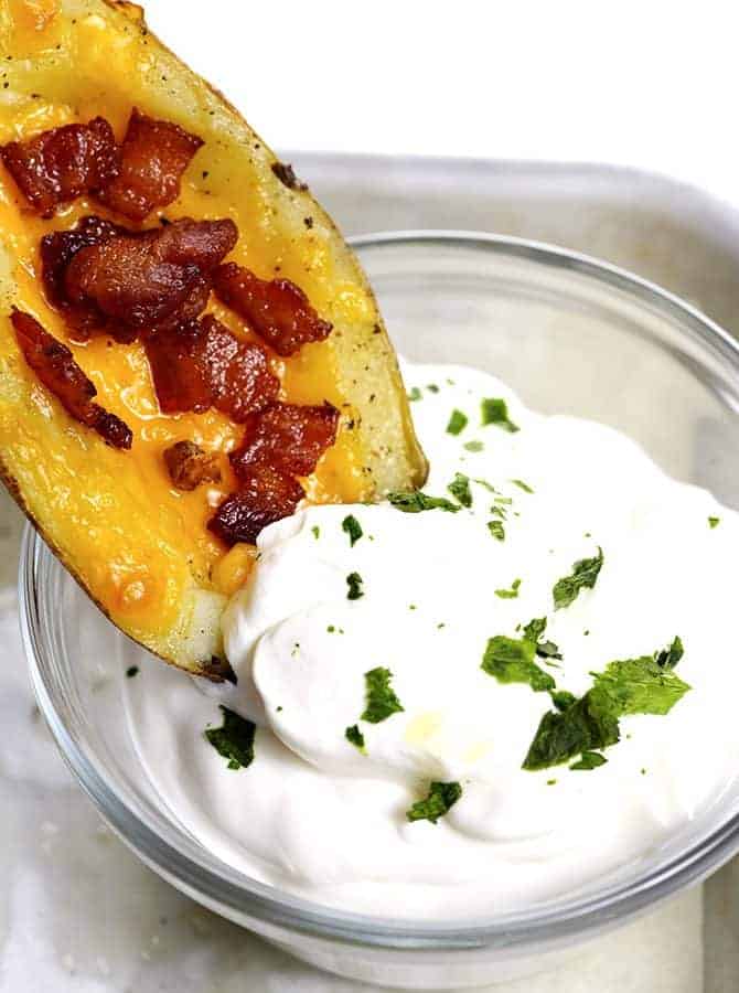 Homemade Potato Skins Recipe - Potato skins make an easy and delicious recipe perfect for parties or game day! // addapinch.com