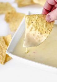 Queso dip makes a delicious appetizer. Made with a special combination of cheeses and ready in 5 minutes, this queso will be a favorite!  // addapinch.com