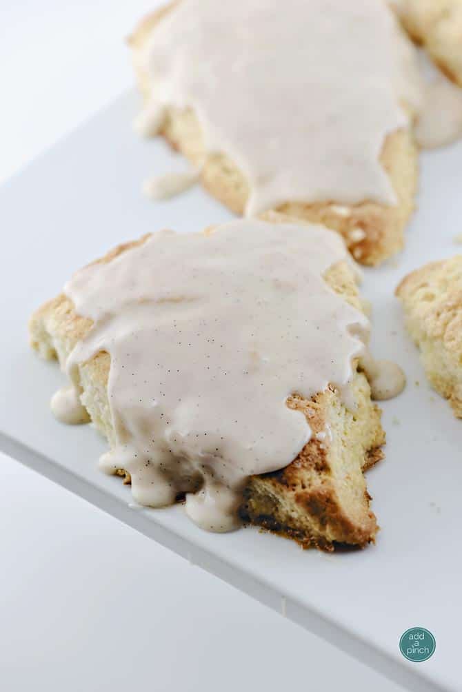 Cream Scones Recipe with Vanilla Bean Glaze from addapinch.com