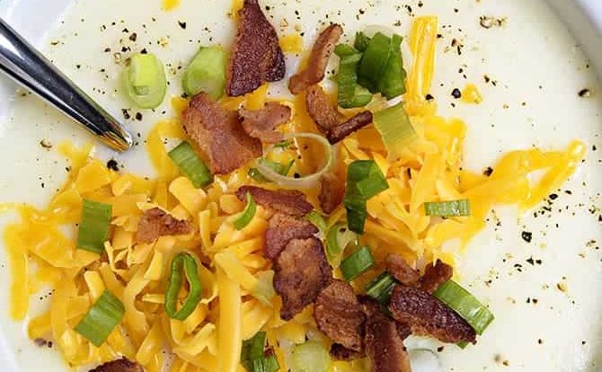 Loaded Baked Potato Soup Recipe - Loaded baked potato soup makes a warm, comforting potato soup recipe. Made with baked potatoes blended into a creamy soup and topped with your potato bar favorites! // addapinch.com