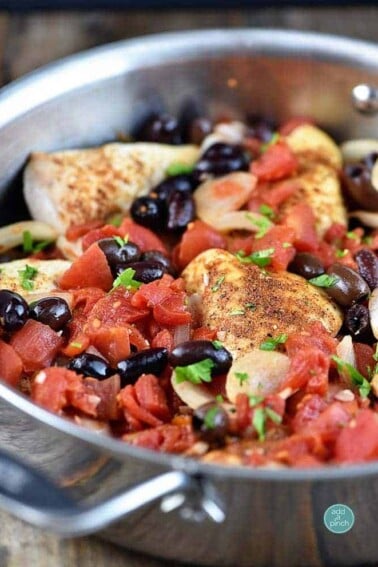 Roasted Chicken with Tomatoes and Olives Recipe from addapinch.com