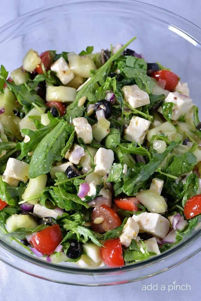 Arugula Greek Salad Recipe from addapinch.com