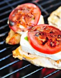 Caprese Grilled Chicken with Balsamic Reduction Recipe - A favorite caprese salad takes center stage with this delicious grilled chicken! // addapinch.com
