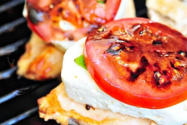 Caprese Grilled Chicken with Balsamic Reduction Recipe - A favorite caprese salad takes center stage with this delicious grilled chicken! // addapinch.com