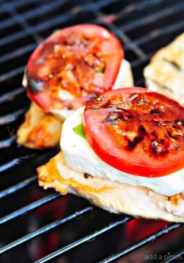 Caprese Grilled Chicken with Balsamic Reduction Recipe - A favorite caprese salad takes center stage with this delicious grilled chicken! // addapinch.com