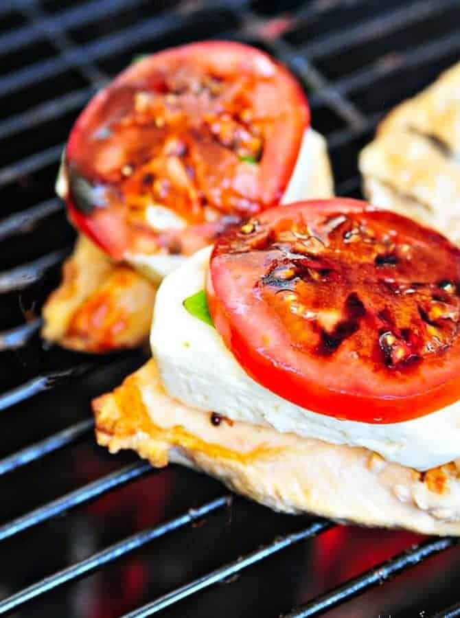 Caprese Grilled Chicken with Balsamic Reduction Recipe - A favorite caprese salad takes center stage with this delicious grilled chicken! // addapinch.com